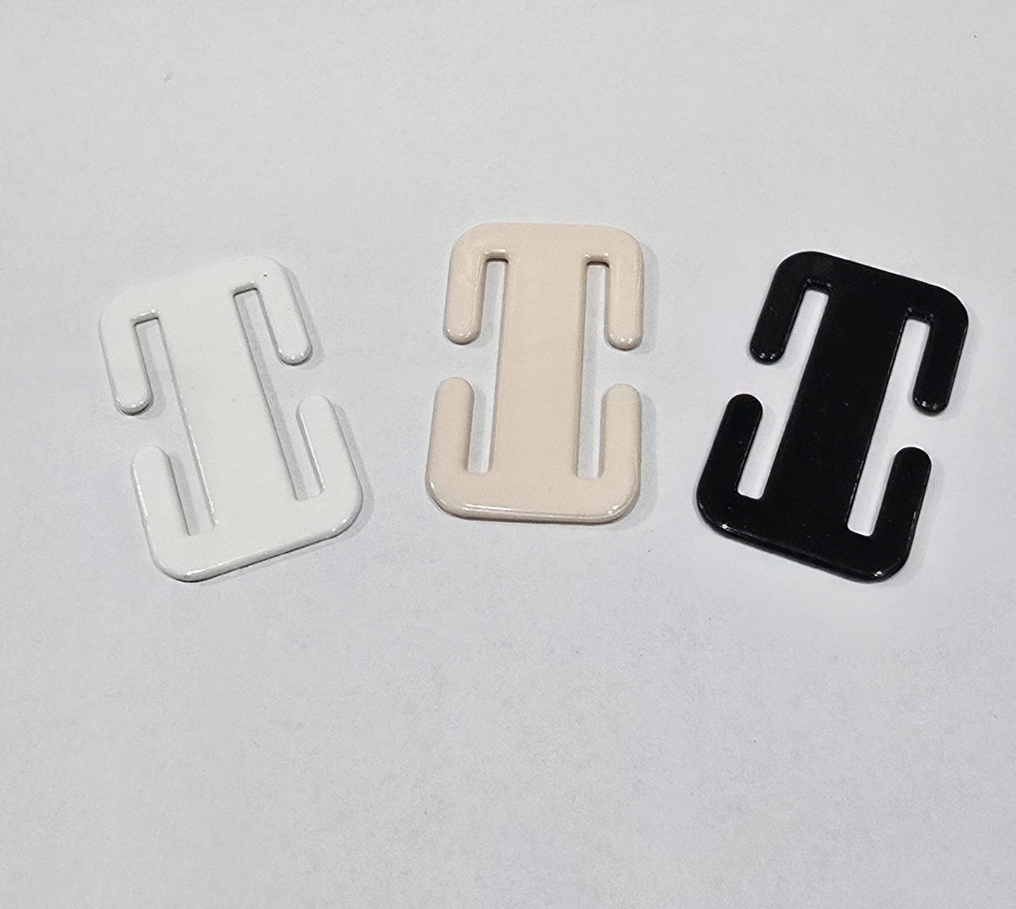Clips per unir els tirants dels sostenidors